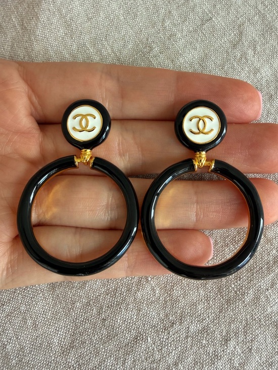 CHANEL Jewelry - 🖤CHANEL Black and White Hoop Earrings with Gold CC Emblem🖤